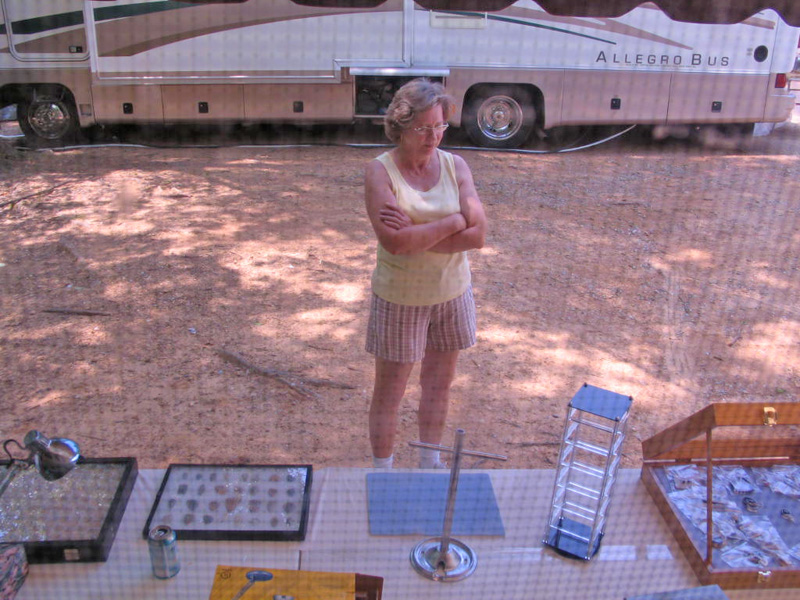 Gloria making sure everything is displayed just right